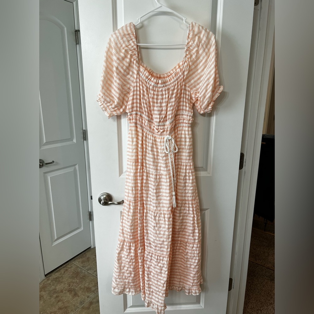 Pink and creamy white striped moon river dress size small. Never worn. NWOT